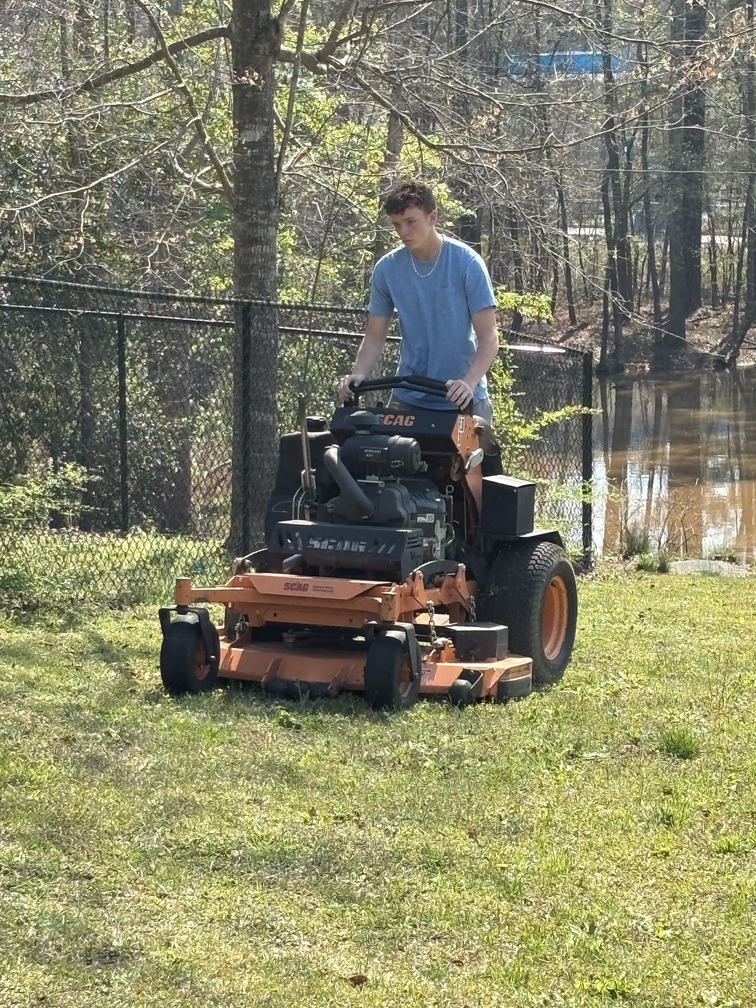 Micah, owner of Clean Cutz Lawns
